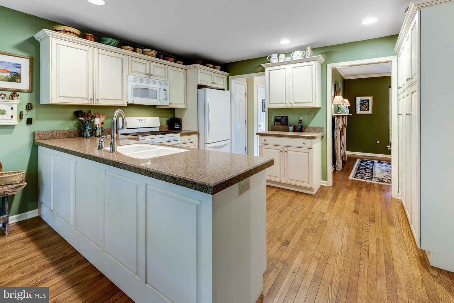 5021 A Church Road Mount Laurel, NJ 08054 - Photo 11 of 30 Kitchen boasts white cabinets &stone-like counters