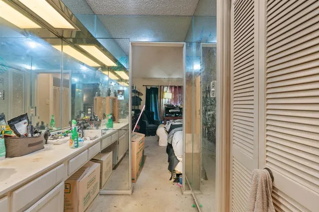 a view of living room with furniture and floor to ceiling window