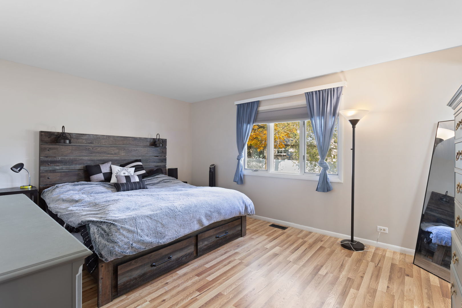 1031 Conrad Court Elk Grove Village, IL 60007 - Photo 11 of 17 a bedroom with a bed and a window