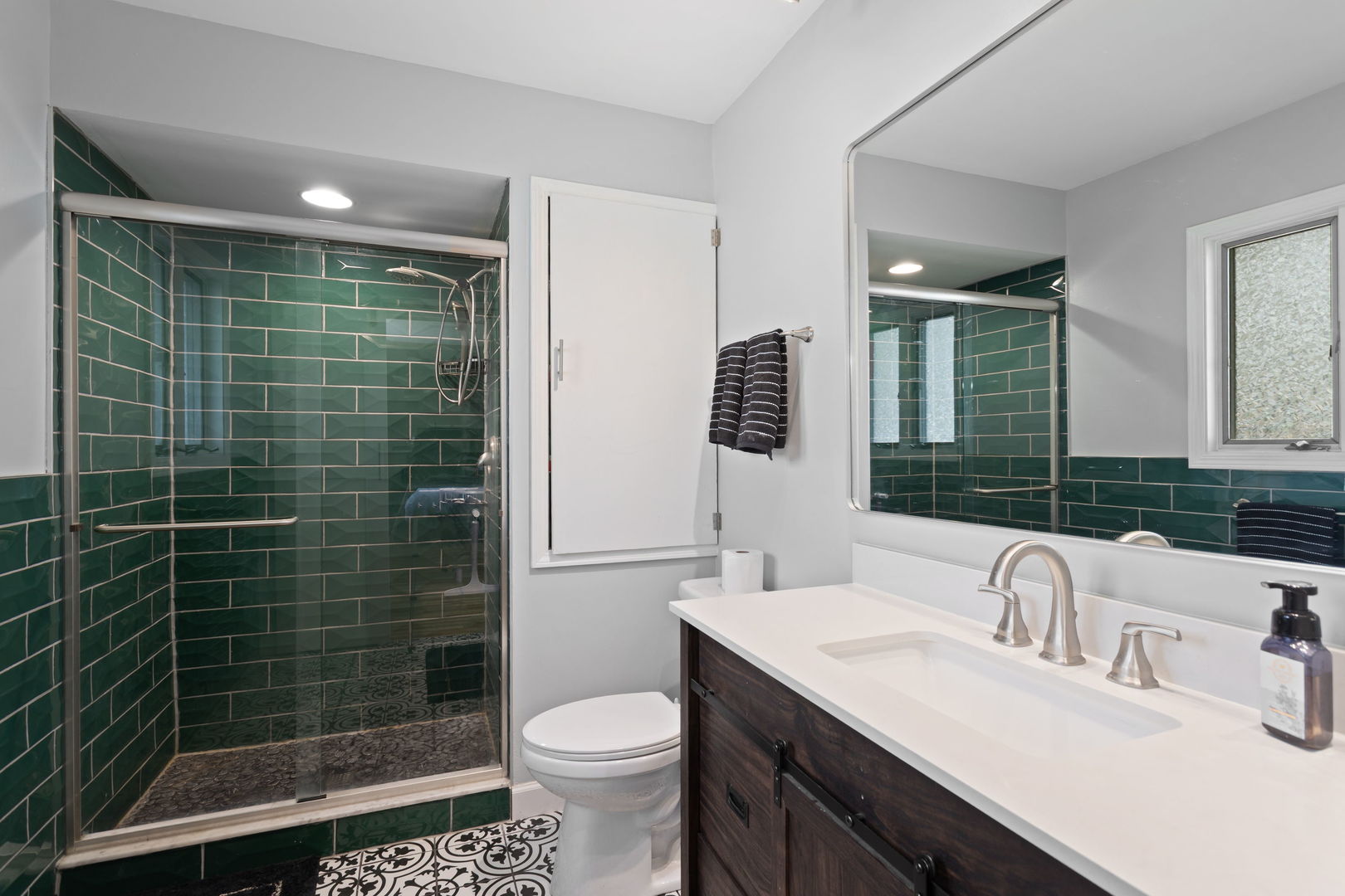 1031 Conrad Court Elk Grove Village, IL 60007 - Photo 14 of 17 a bathroom with a sink toilet and shower