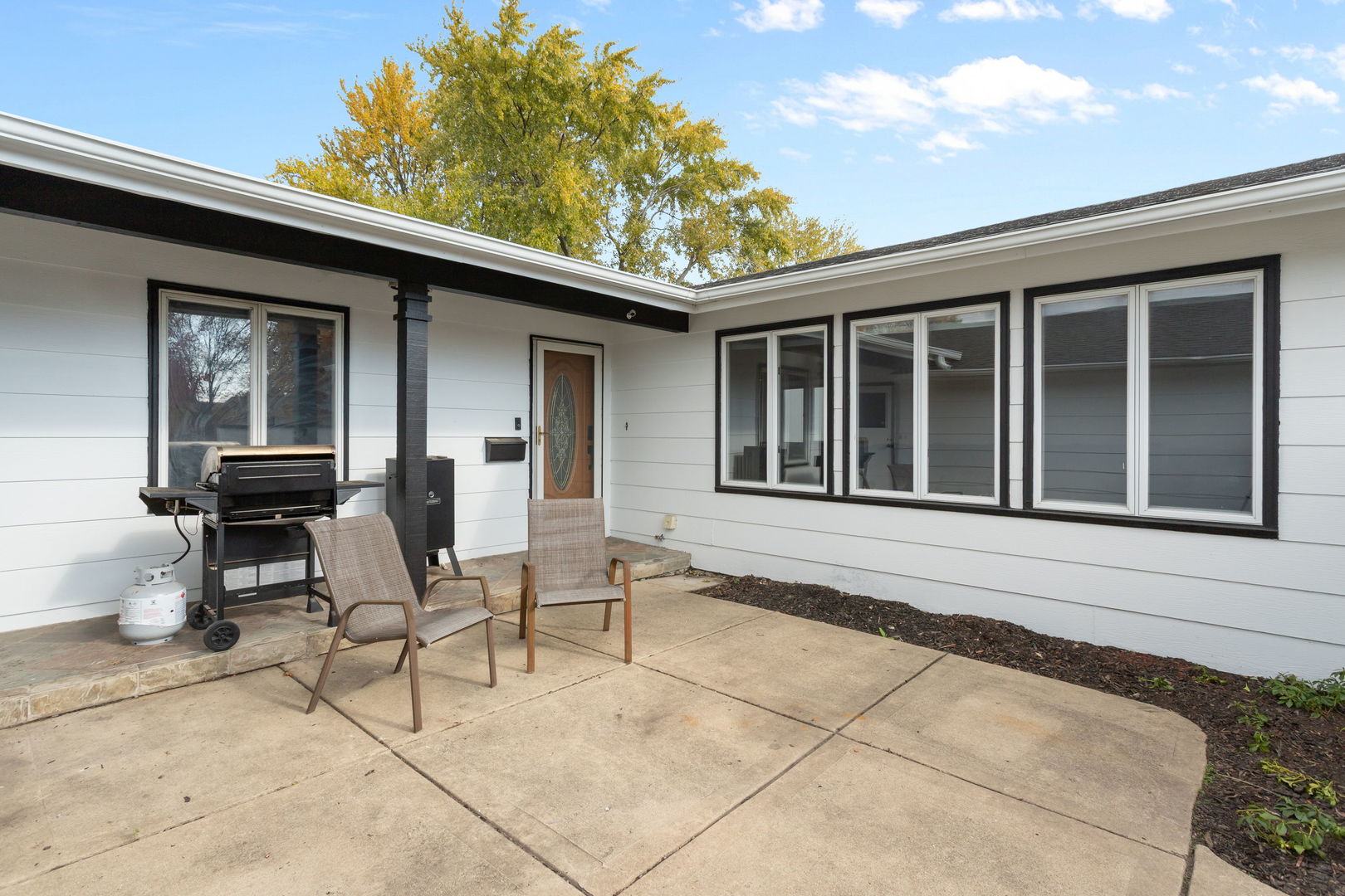 1031 Conrad Court Elk Grove Village, IL 60007 - Photo 17 of 17 a view of house with backyard outdoor seating area and furniture