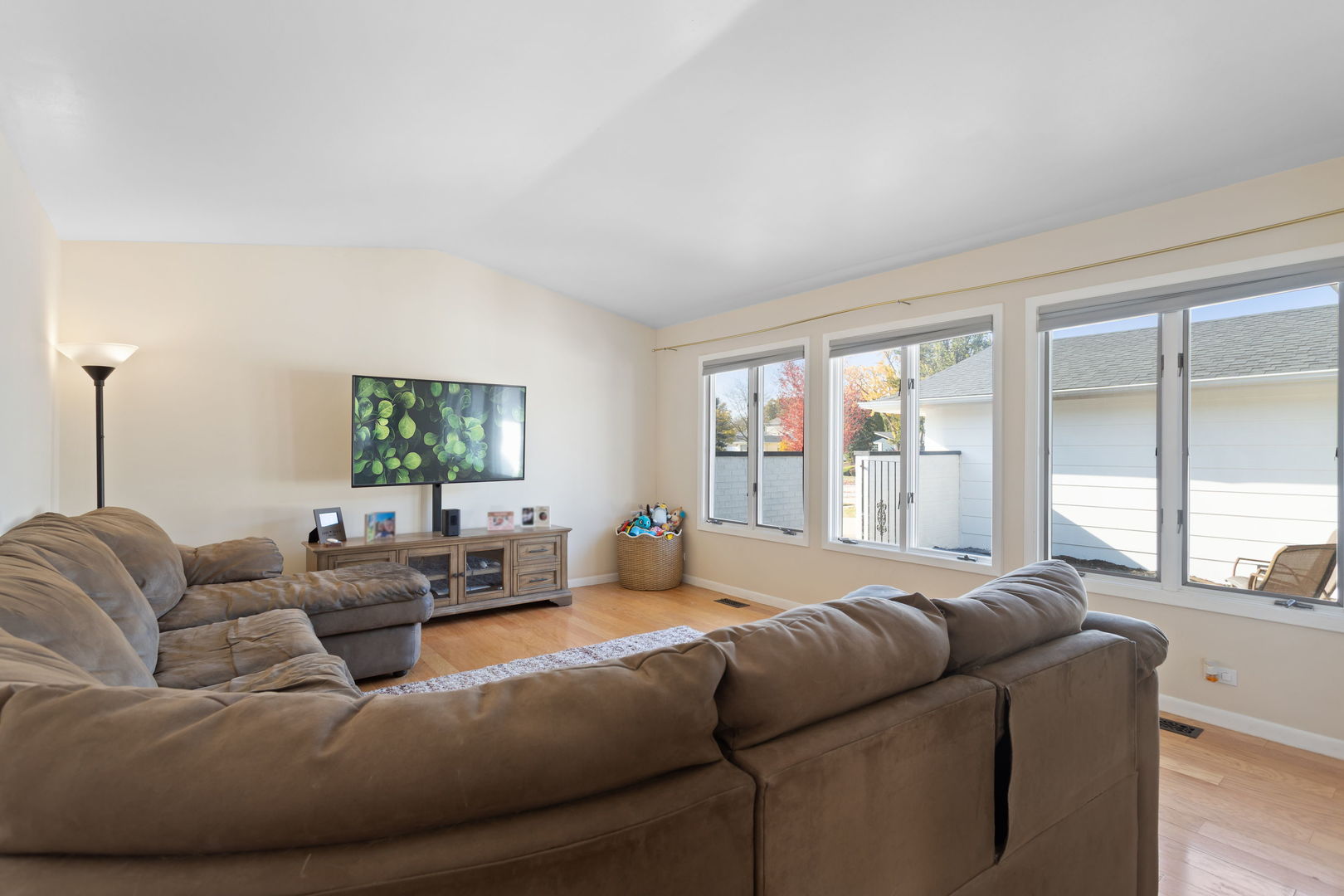 1031 Conrad Court Elk Grove Village, IL 60007 - Photo 4 of 17 a living room with furniture and a large window