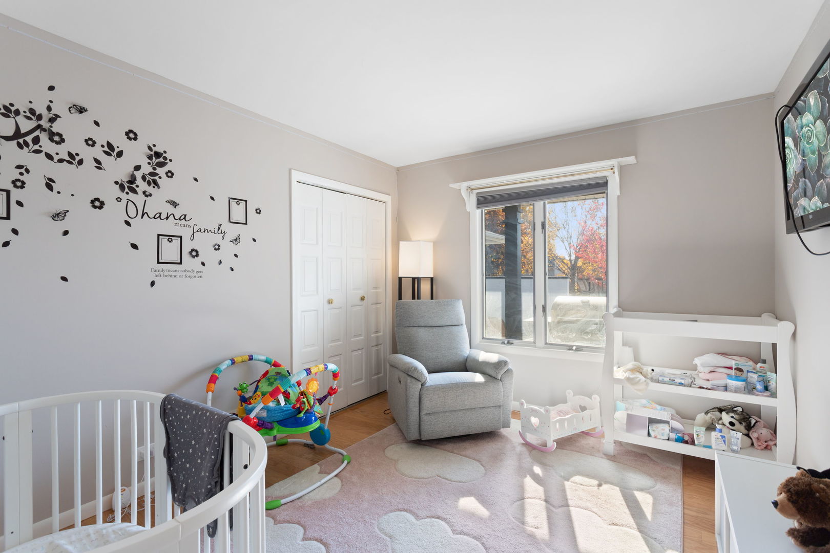1031 Conrad Court Elk Grove Village, IL 60007 - Photo 9 of 17 a bedroom with furniture and a window