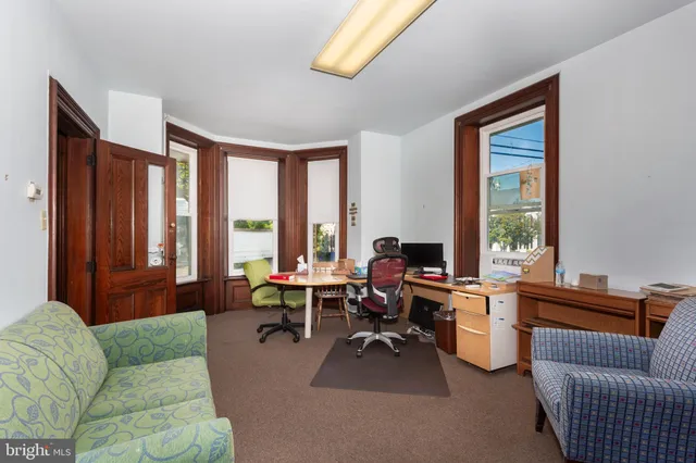 a view of cabinets a washer and dryer
