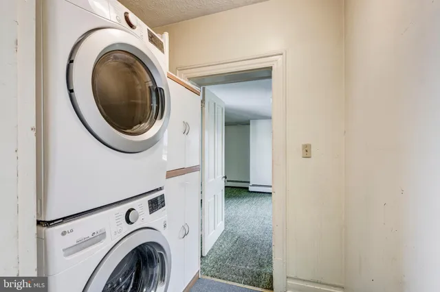 a view of entryway with a front door