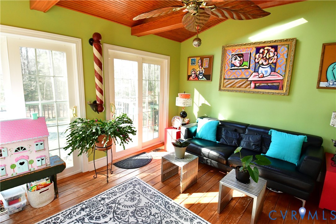 9101 Woodpecker Road Chesterfield, VA 23838 - Photo 14 of 50 a living room with furniture and a large window