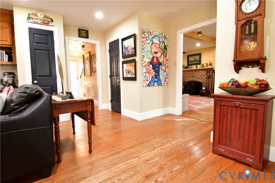 9101 Woodpecker Road Chesterfield, VA 23838 - Photo 24 of 50 a view of a livingroom with furniture and wooden floor