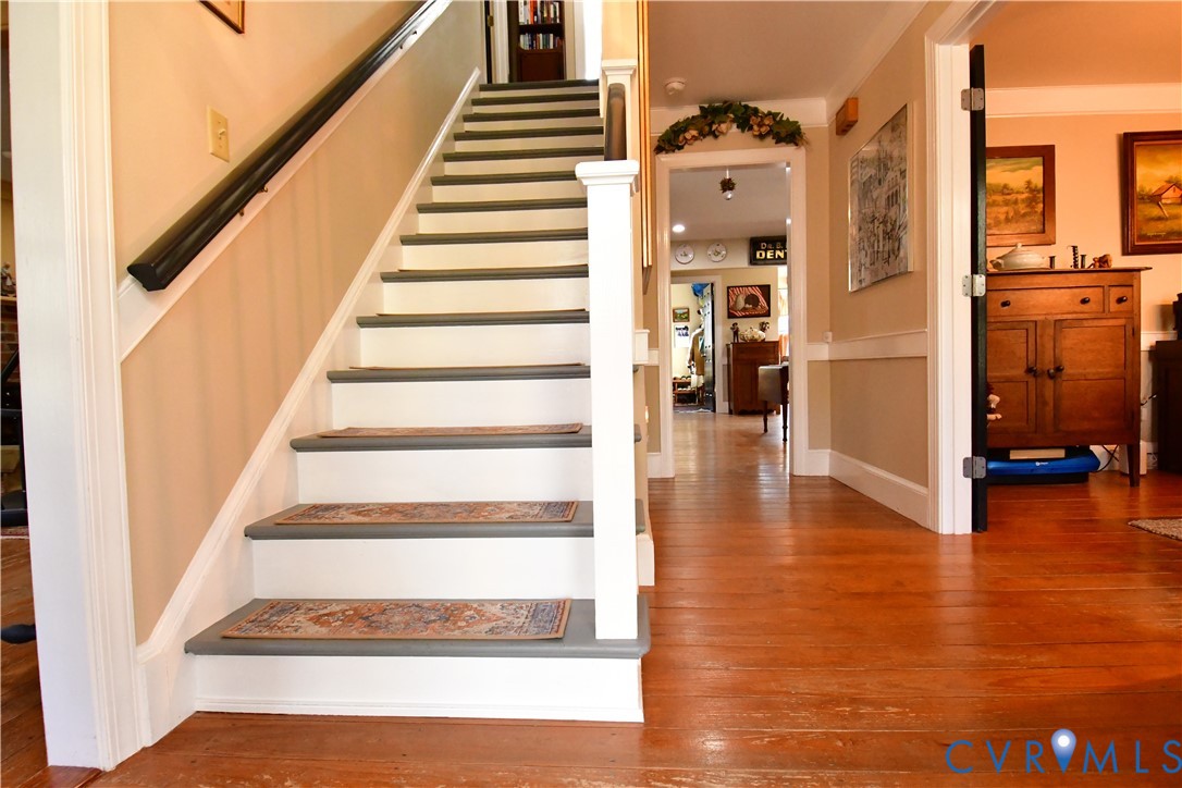 9101 Woodpecker Road Chesterfield, VA 23838 - Photo 26 of 50 Stairs with wood-type flooring and baseboards