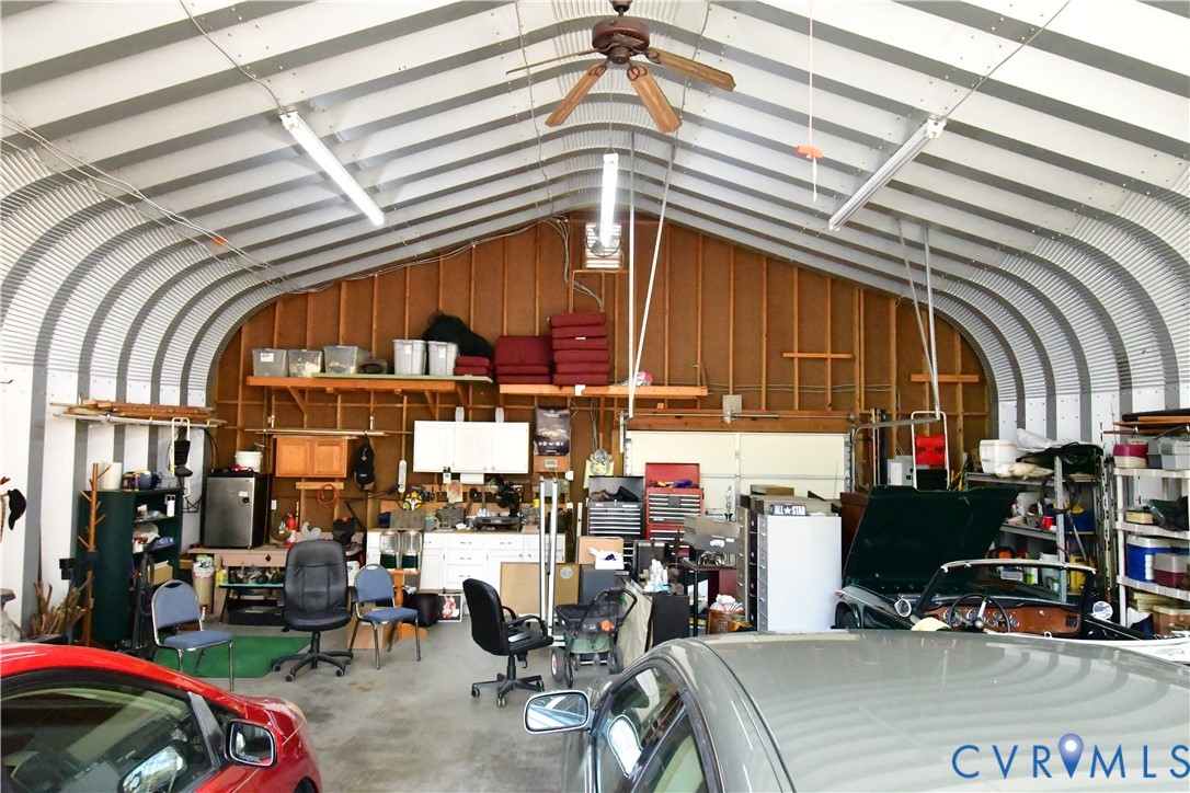 9101 Woodpecker Road Chesterfield, VA 23838 - Photo 47 of 50 Garage featuring a ceiling fan