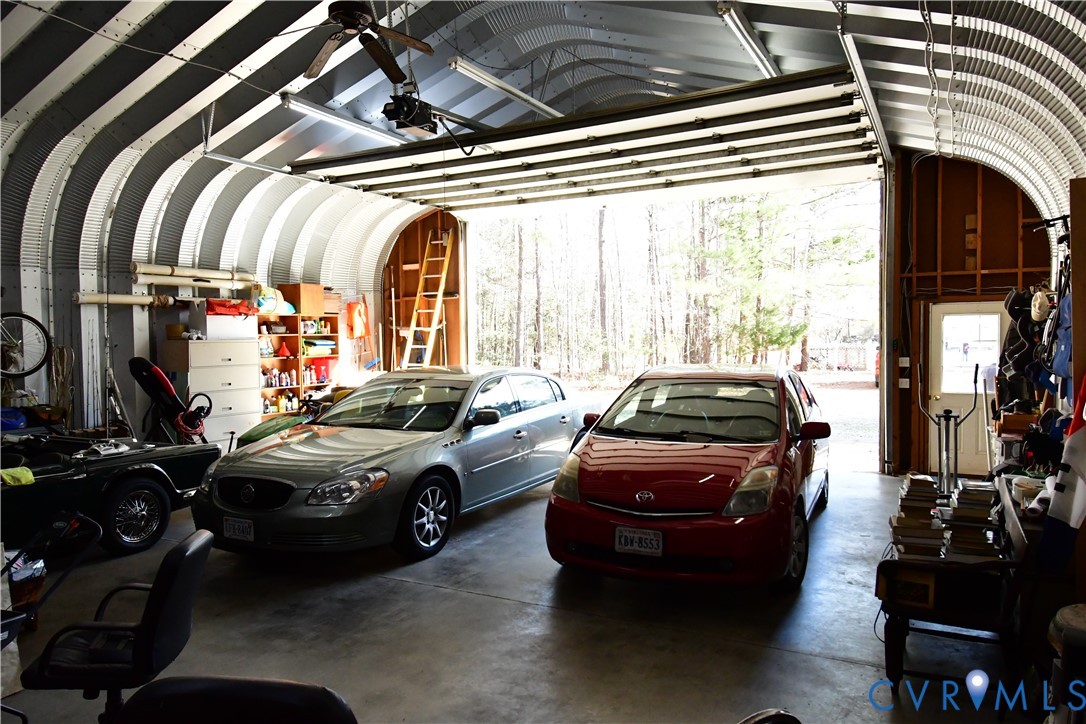 9101 Woodpecker Road Chesterfield, VA 23838 - Photo 49 of 50 a cars parked in front of a building