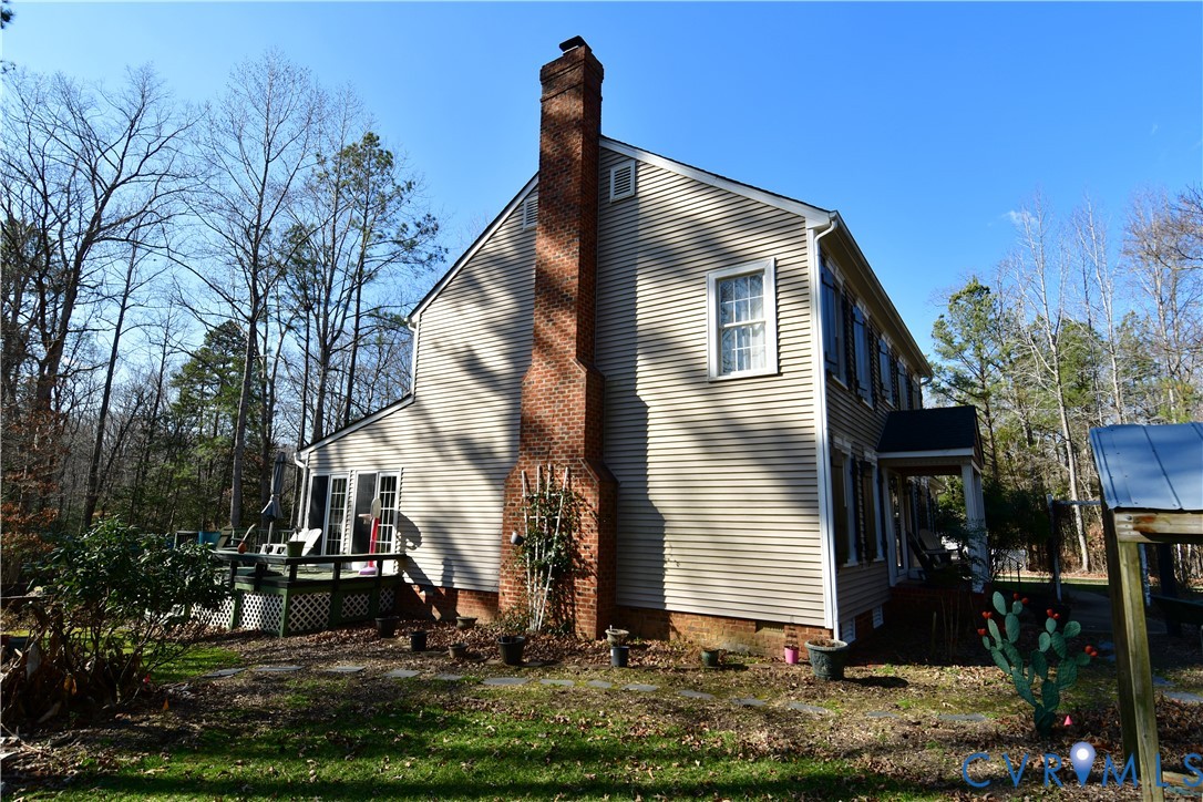 9101 Woodpecker Road Chesterfield, VA 23838 - Photo 7 of 50 a front view of house with yard