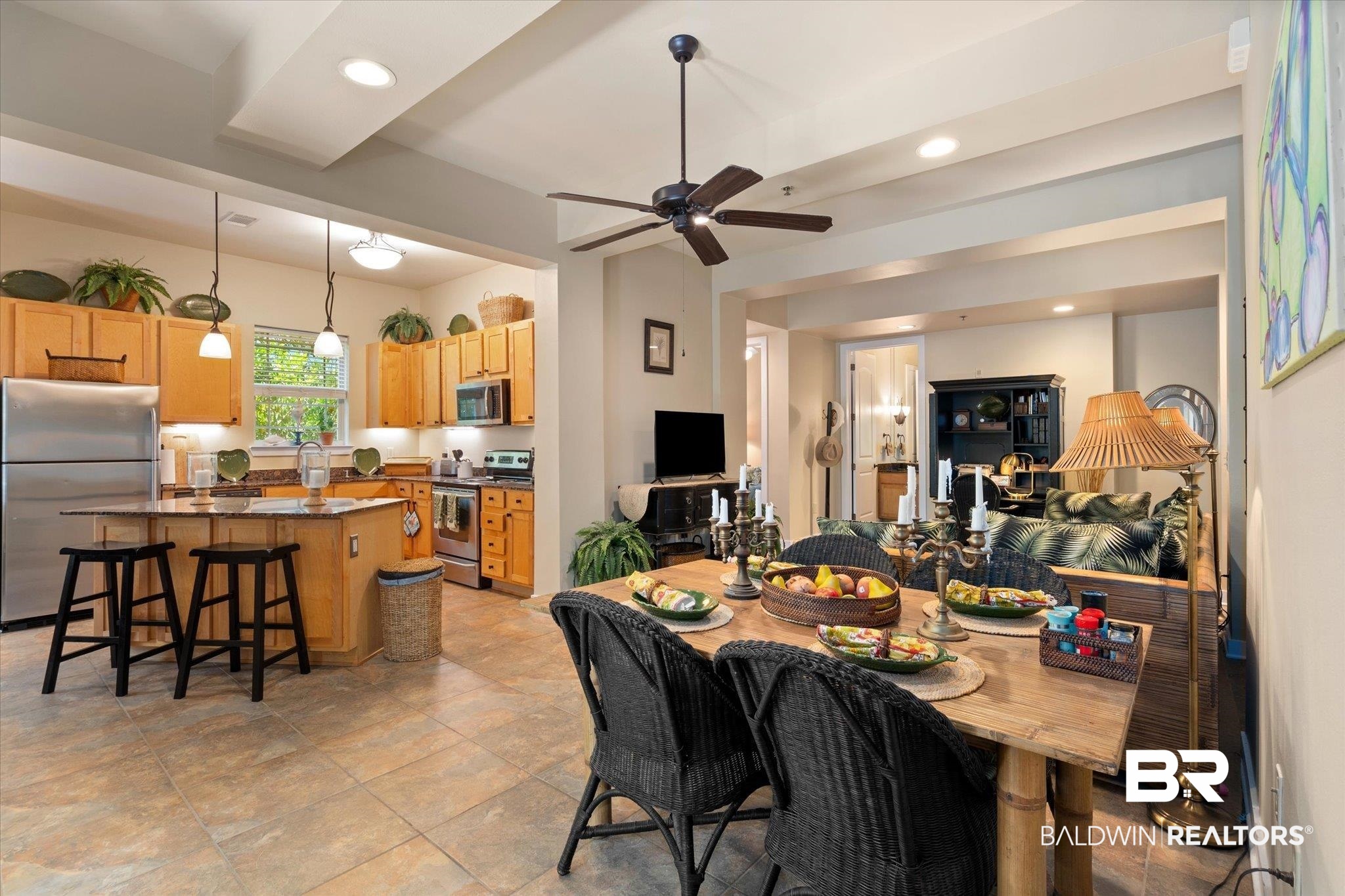 1430 Regency Road, Unit C103 Gulf Shores, AL 36542 - Photo 7 of 29 Dining space with a ceiling fan, recessed lighting, and light stone finish flooring