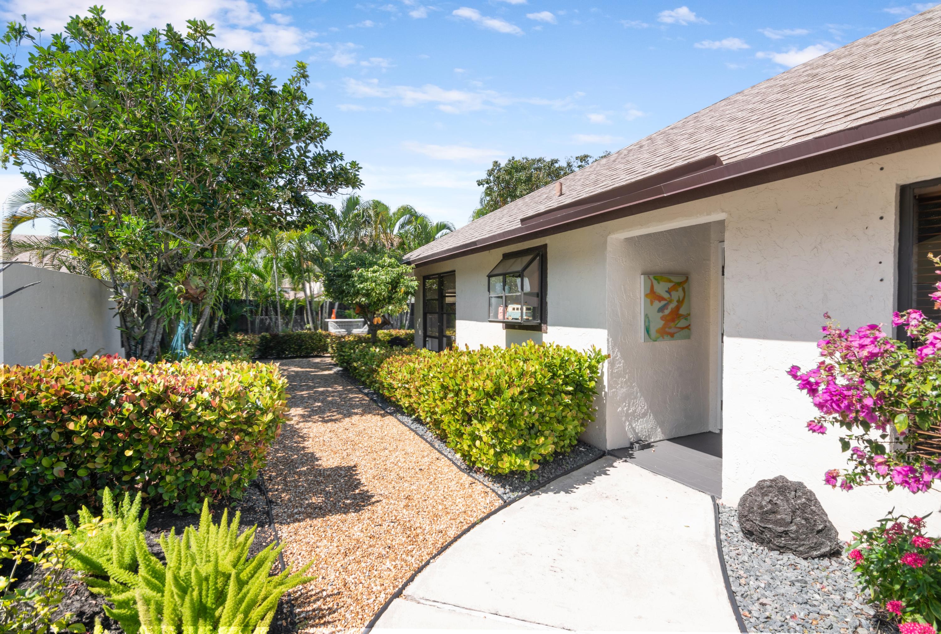 234 Southwest 28th Avenue Delray Beach, FL 33445 - Photo 6 of 32 Front Door & Zen Garden