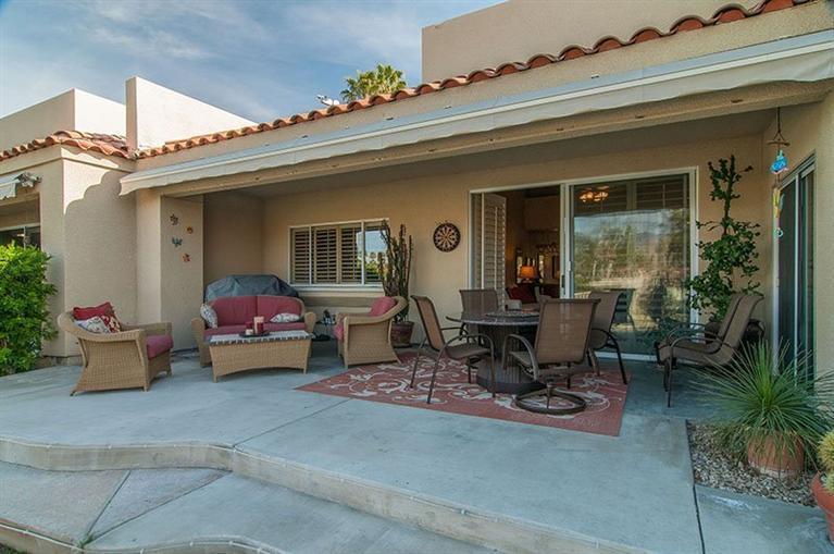 138 Lakeshore Drive Rancho Mirage, CA 92270 - Photo 21 of 24 a living room with furniture and a potted plant