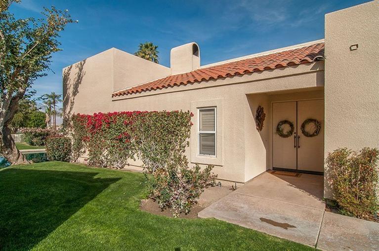 138 Lakeshore Drive Rancho Mirage, CA 92270 - Photo 7 of 24 a view of a house with a yard