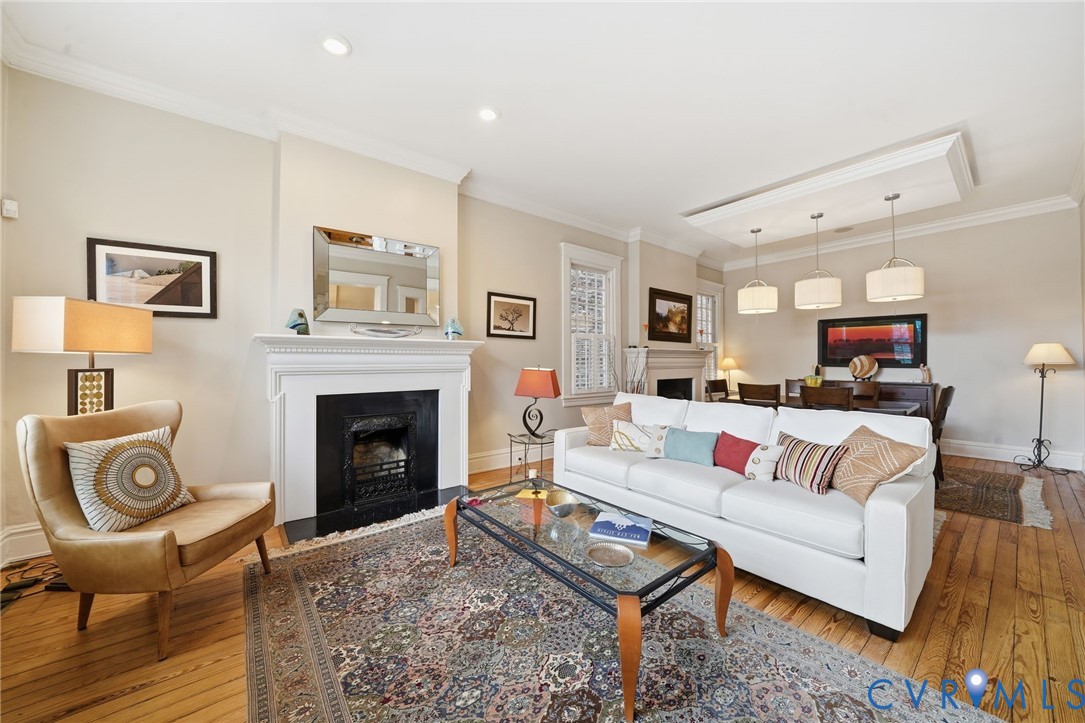 2005 Stuart Avenue Richmond, VA 23220 - Photo 14 of 29 a living room with furniture and a fireplace