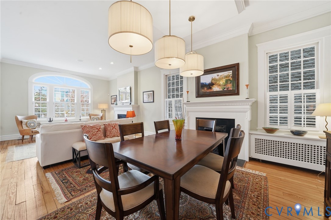 2005 Stuart Avenue Richmond, VA 23220 - Photo 17 of 29 a view of a dining room with furniture window and wooden floor