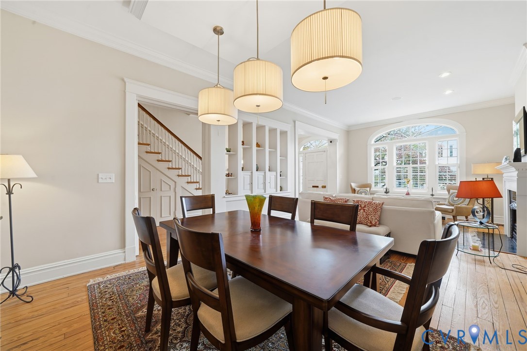 2005 Stuart Avenue Richmond, VA 23220 - Photo 18 of 29 a view of a dining room with furniture and wooden floor