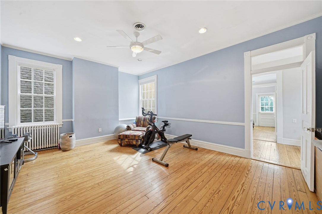 2005 Stuart Avenue Richmond, VA 23220 - Photo 19 of 29 a view of a room with gym equipment and windows