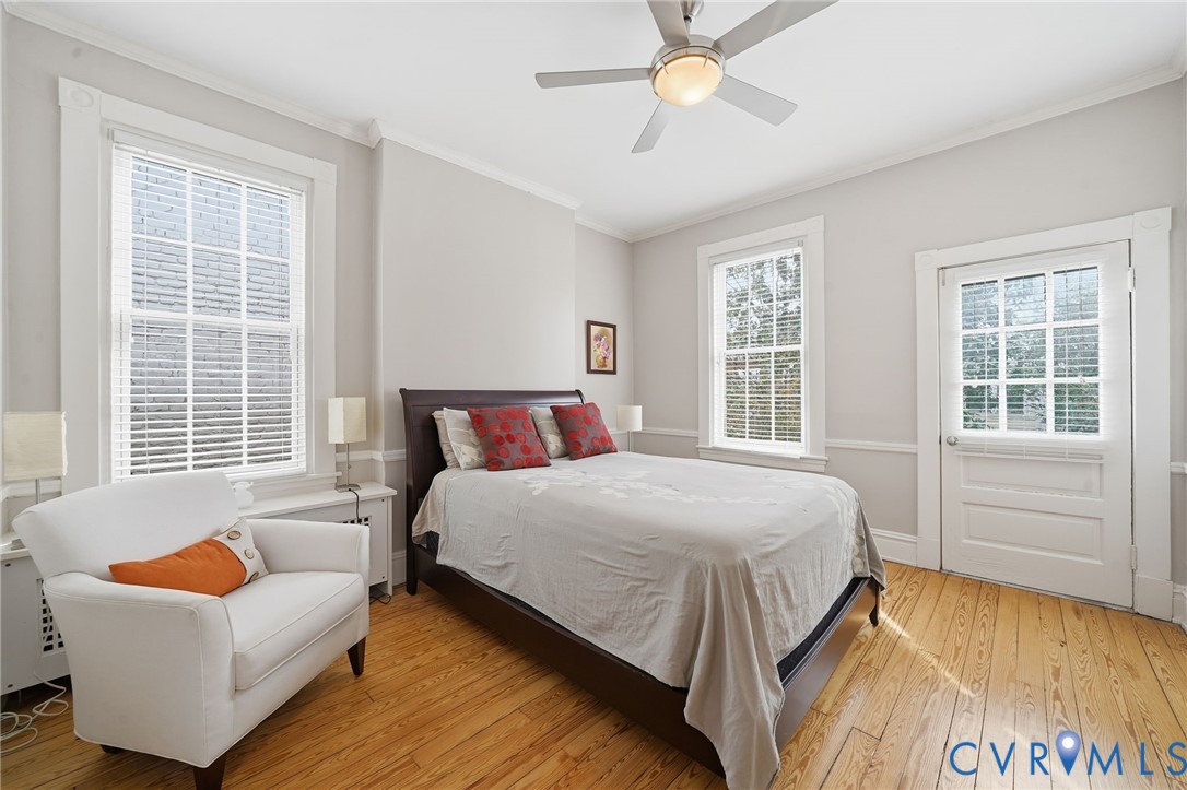 2005 Stuart Avenue Richmond, VA 23220 - Photo 21 of 29 a bedroom with a bed and a window