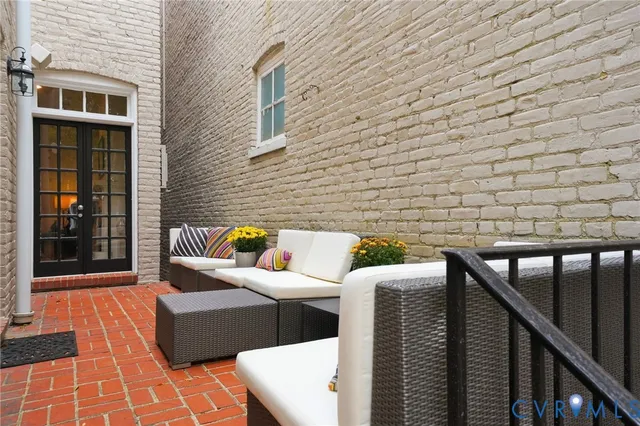 a view of a backyard with sitting area
