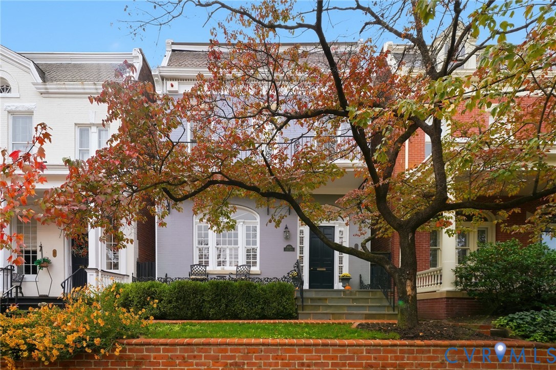 2005 Stuart Avenue Richmond, VA 23220 - Photo 4 of 29 a front view of a house with garden
