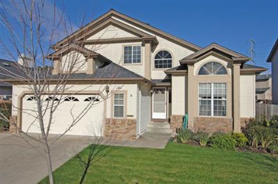 463 Noonan Ranch Lane Santa Rosa, CA 95403 - Photo 1 of 10 a front view of a house with a yard and garage
