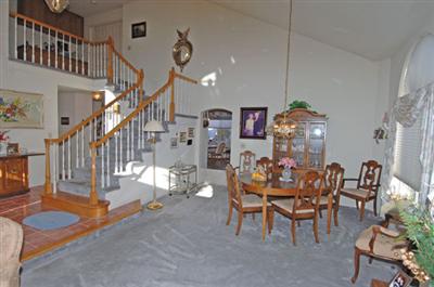 463 Noonan Ranch Lane Santa Rosa, CA 95403 - Photo 6 of 10 a dining room with furniture and wooden floor
