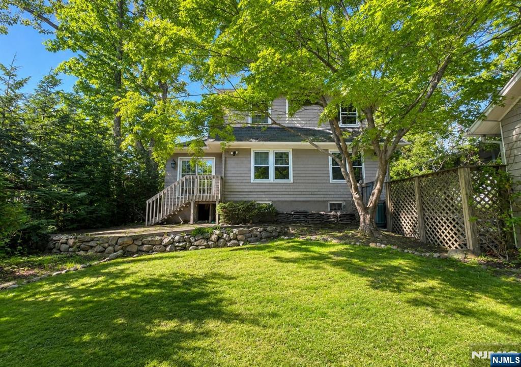84 Valley View Avenue Ridgewood, NJ 07450 - Photo 17 of 20 a front view of house with yard and green space