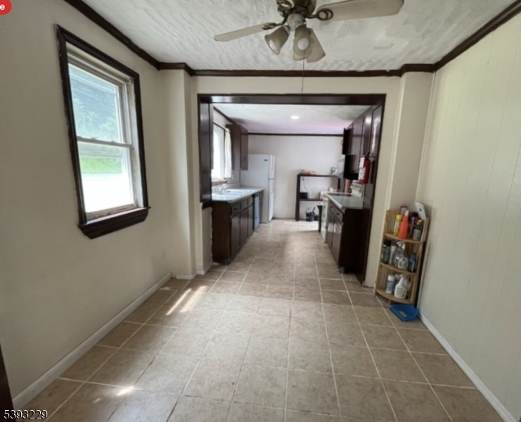60 Vail Road Blairstown, NJ 07832 - Photo 6 of 26 a view of a livingroom with furniture and a ceiling fan