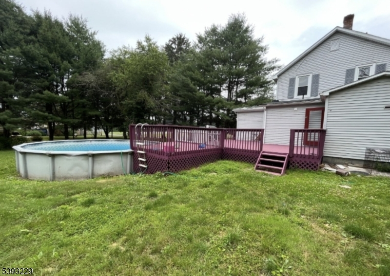 60 Vail Road Blairstown, NJ 07832 - Photo 8 of 26 a view of a house with a yard and sitting area