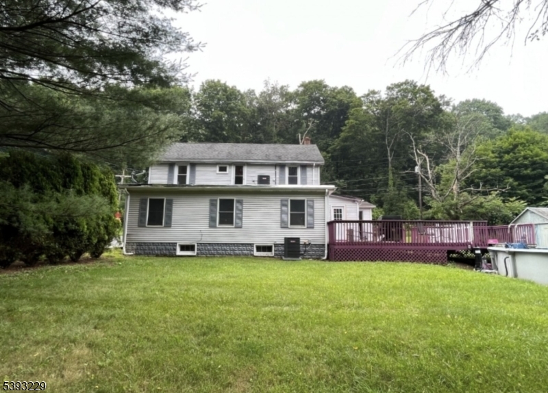 60 Vail Road Blairstown, NJ 07832 - Photo 9 of 26 a view of a house with a big yard and a large tree