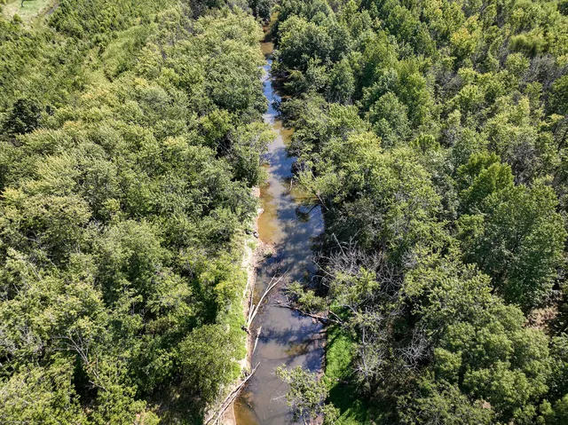 a view of an ocean and mountain