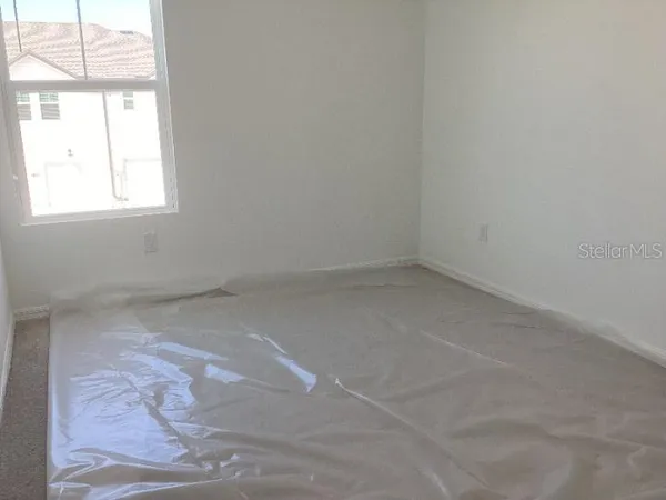 an empty room with a window