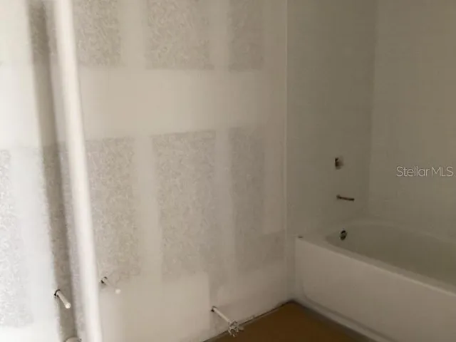 a bathroom with a bathtub