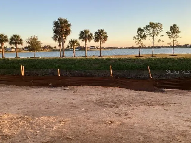 a view of kitchen and wooden floor