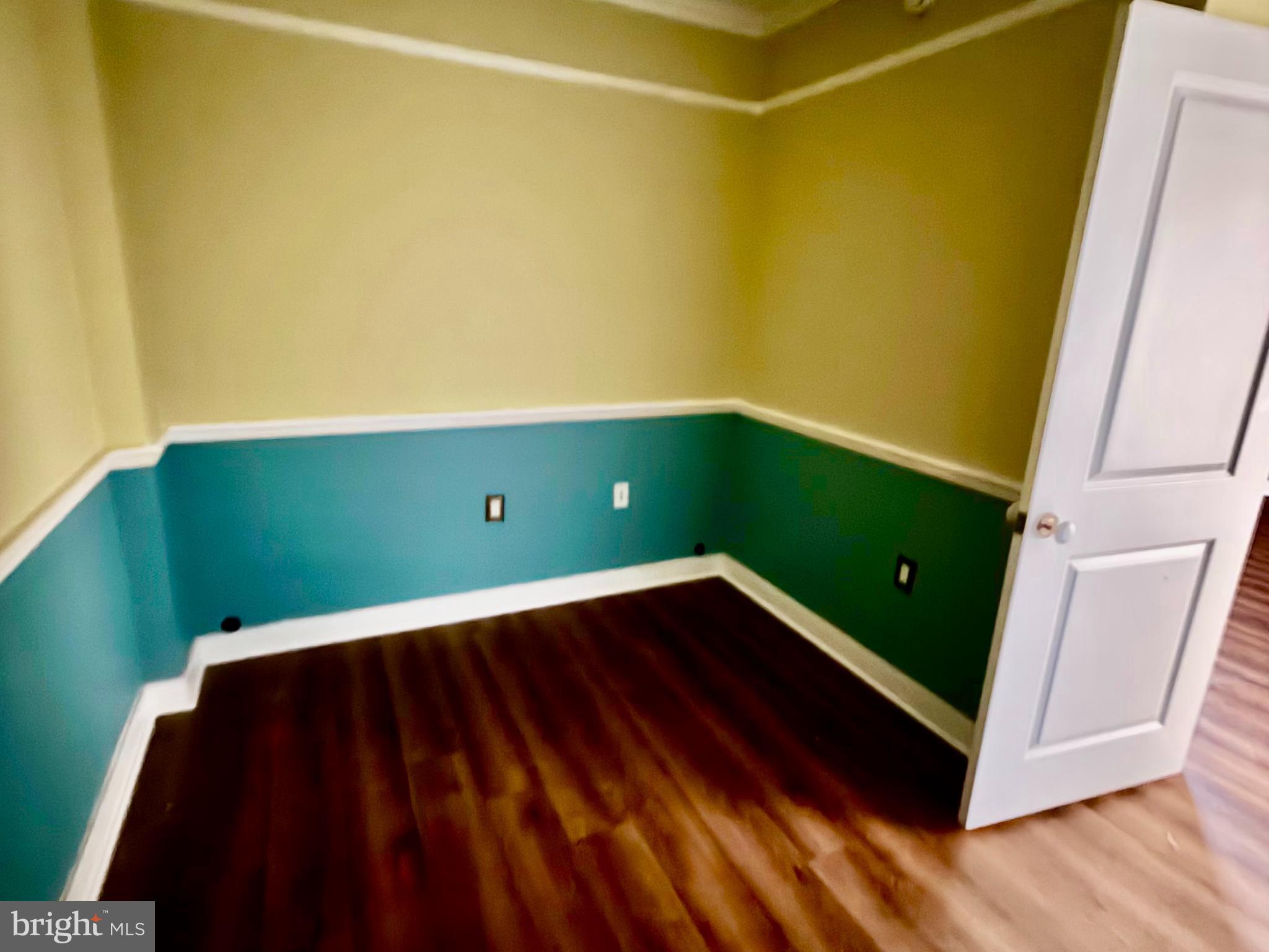 555 Massachusetts Avenue Northwest, Unit 815 Washington, DC 20001 - Photo 10 of 20 a view of room with window and wooden floor