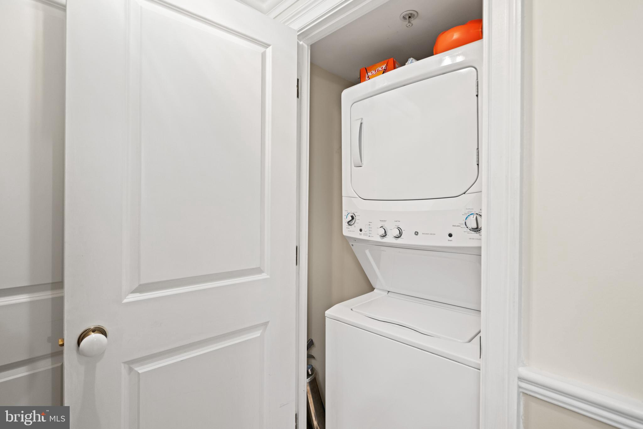 555 Massachusetts Avenue Northwest, Unit 815 Washington, DC 20001 - Photo 18 of 20 a utility room with dryer and washer
