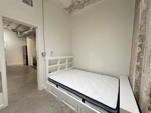 a view of bedroom with hallway