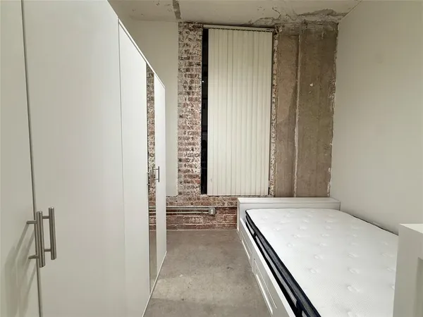 a bathroom with a bathtub and a sink