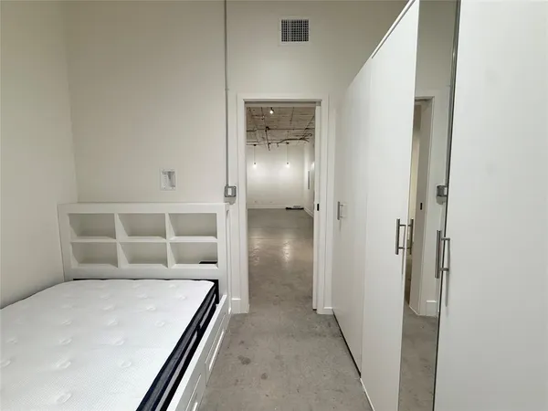 a gym room with lots of gym equipment