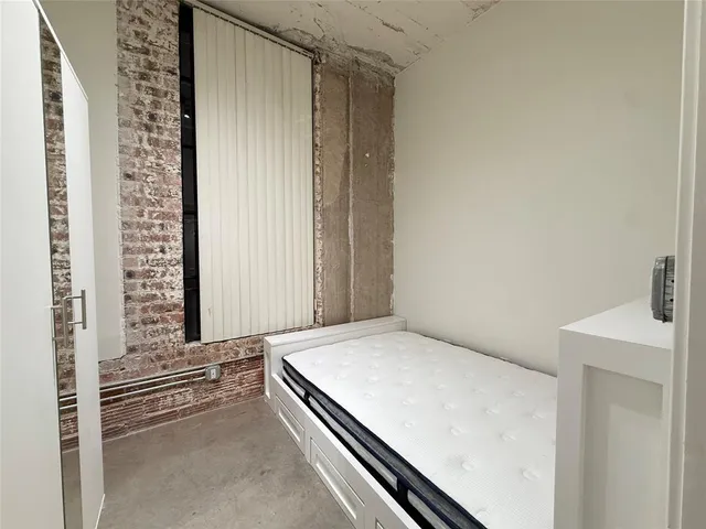 wooden floor with closet