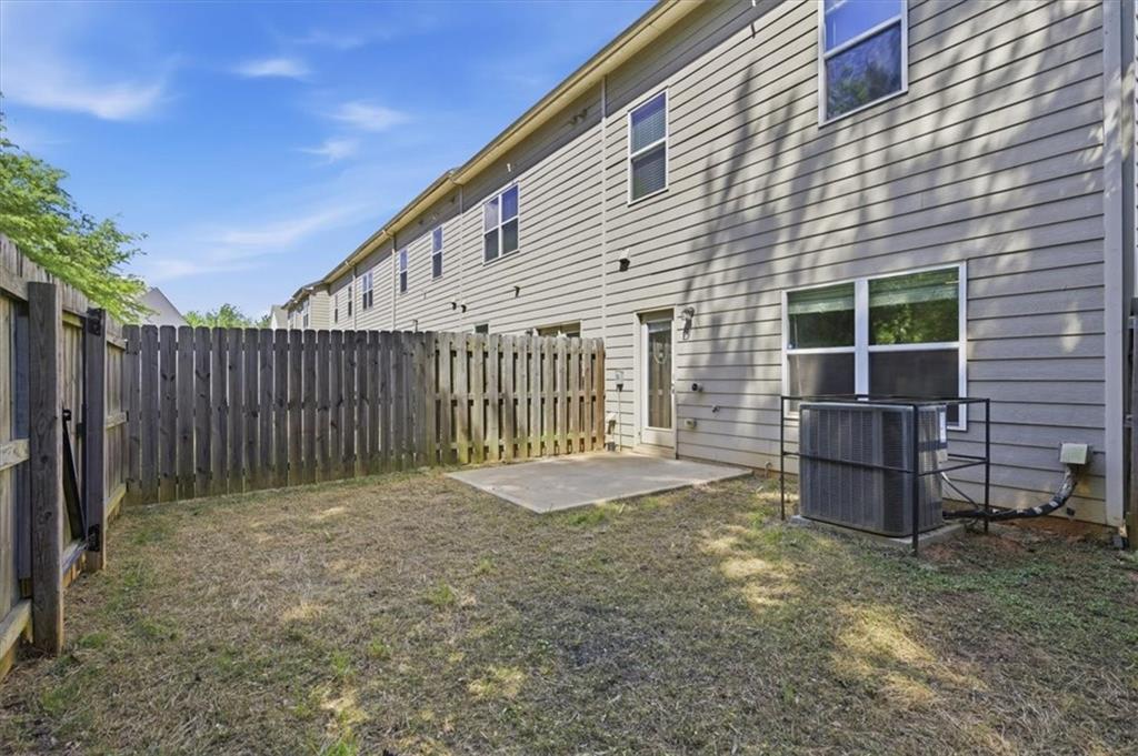 5064 Longview Walk Decatur, GA 30035 - Photo 4 of 30 a view of backyard with wooden fence