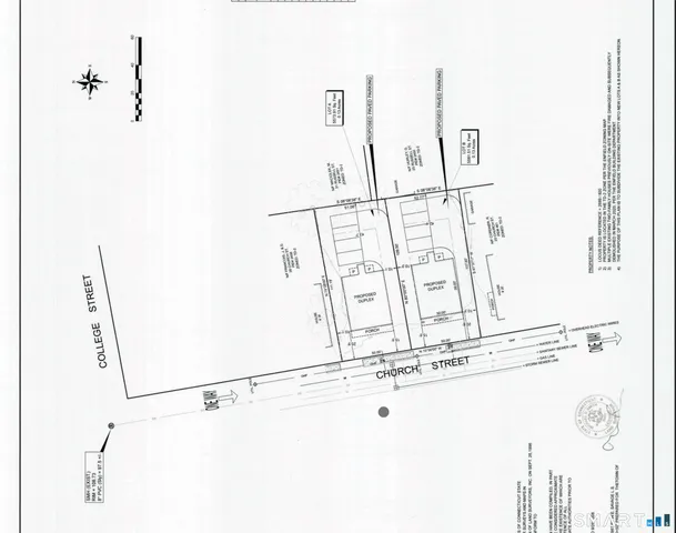 a bathroom with a shower and a sink