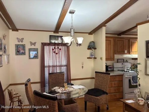 a view of a dining room with furniture