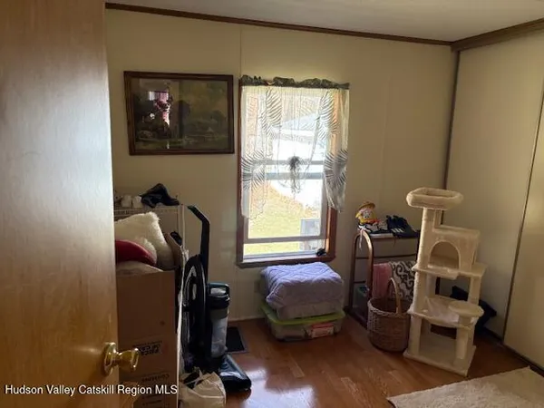 a room with gym equipment and windows