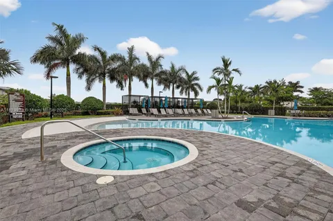 a view of a house with a swimming pool