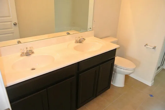 a bathroom with a sink and a toilet