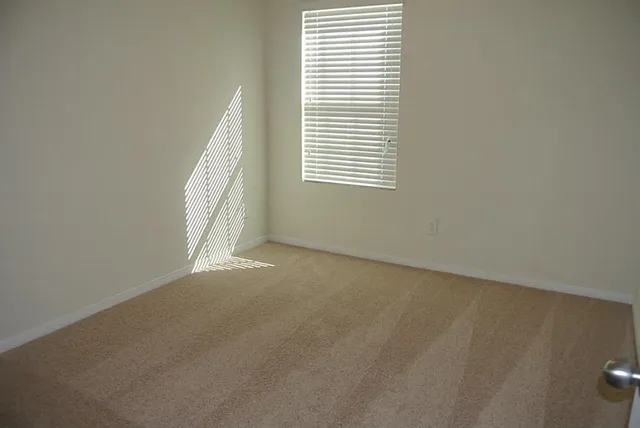 an empty room with a window