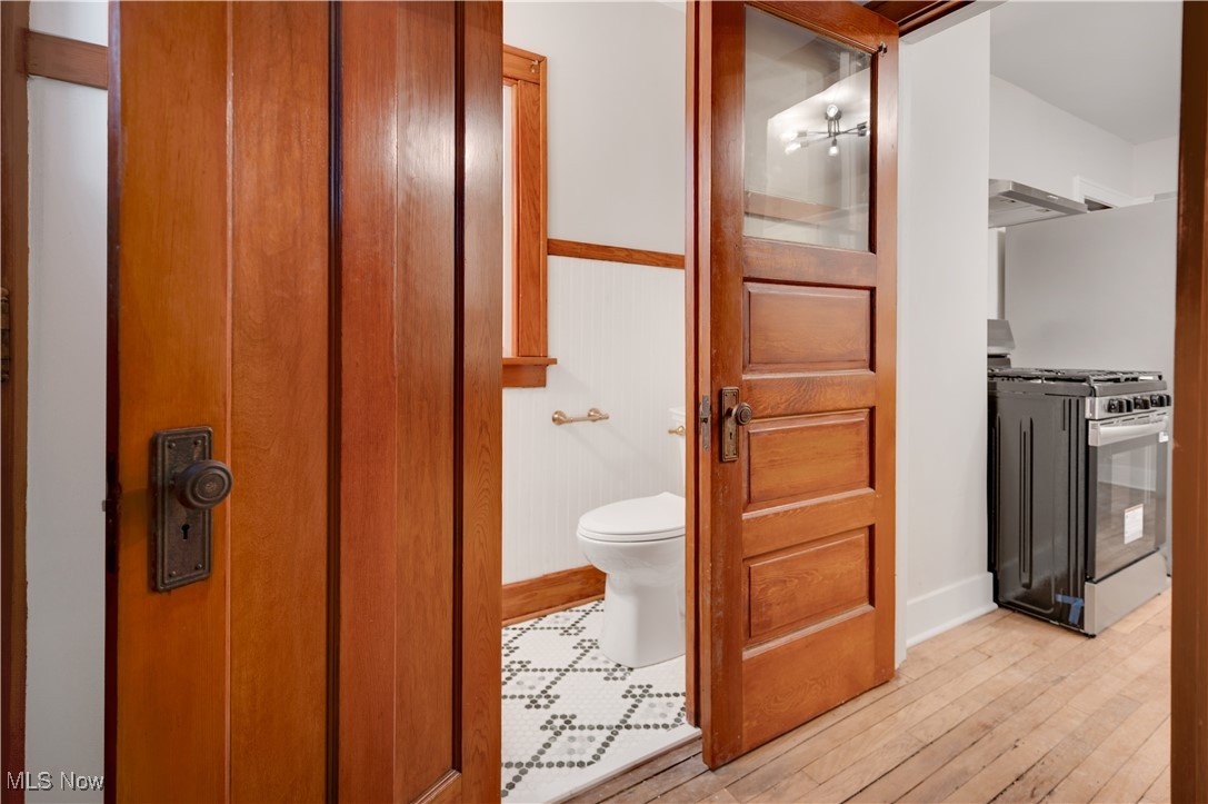 2016 Rossmoor Road Cleveland Heights, OH 44118 - Photo 23 of 46 Bathroom featuring light wood finished floors and toilet